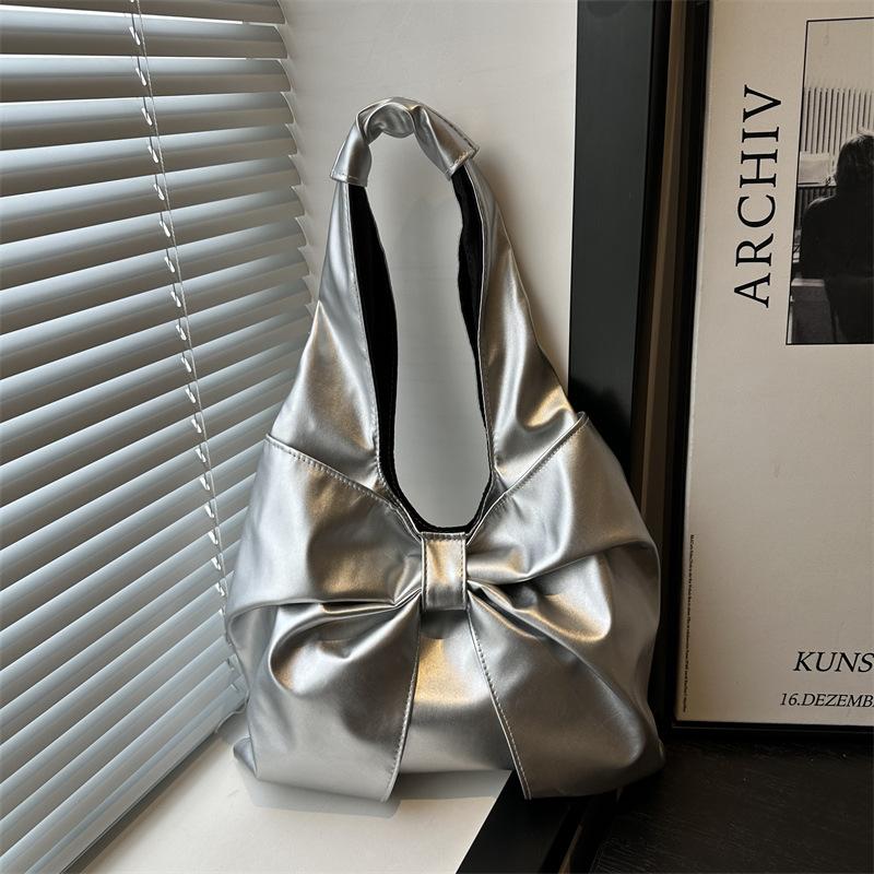 Korean version of casual underarm women's bag 2025 new simple bow design sense tote bag simple portable shoulder bag