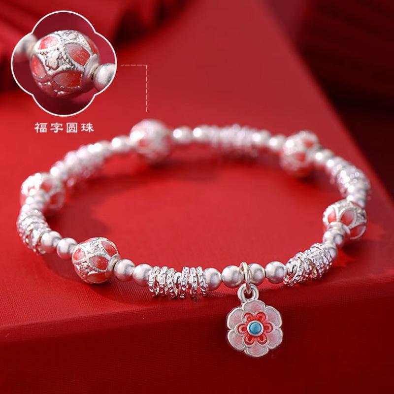 Enamel color Baoxiang flower bracelet, lucky character flower ball entanglement bracelet, light luxury high-end bracelet, fashionable and versatile