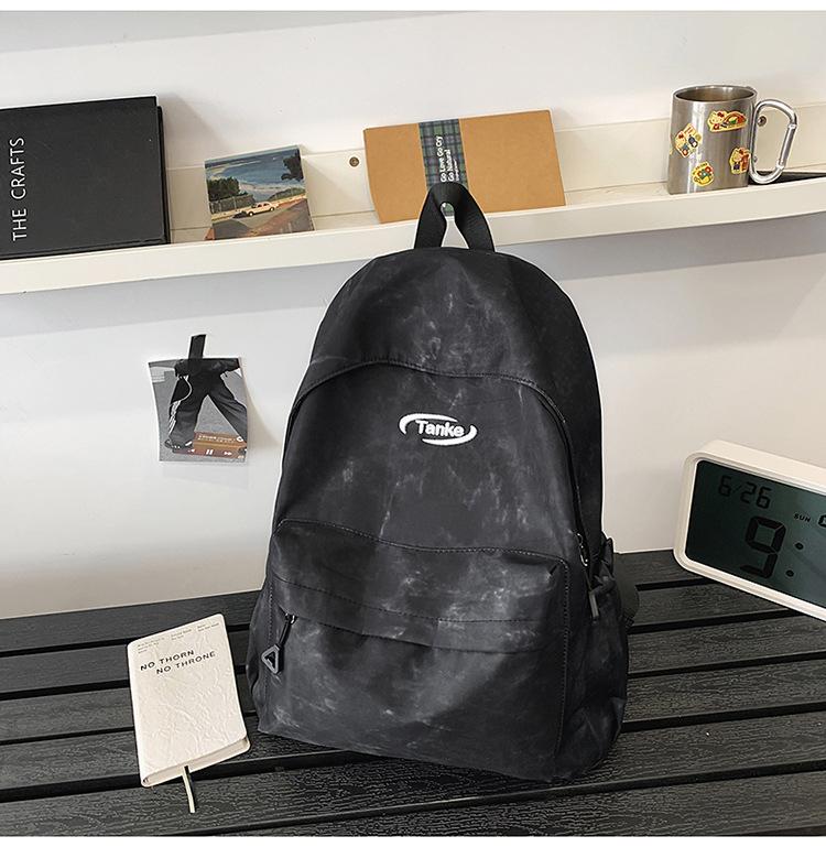 Schoolbag schoolbag college student simple Korean version tie-dye high school backpack large capacity junior high school Japanese ins versatile