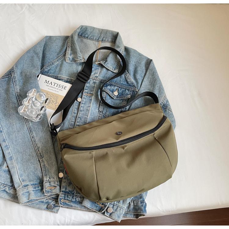 

2025 лето новая парусиновая сумка-пельмень нишевый дизайн высокое чувство моды универсальная для выхода в свет для поездок на работу сумка-мессенджер зелёный