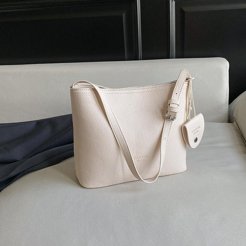 

Bag New Summer Fashion Women s Korean Oblique Temperament Simple Shoulder Bucket Commuter 2025 Versatile Niche Satchel