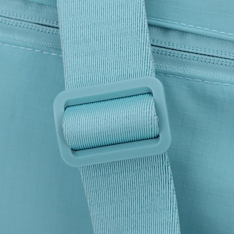 Borsa a tracolla sottile con tasche frontali e tracolla regolabile in nylon tinta unita