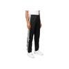 Adidas Pantalón de chándal Originals Essentials de color sólido con cintura elástica para hombre Negro HN6098