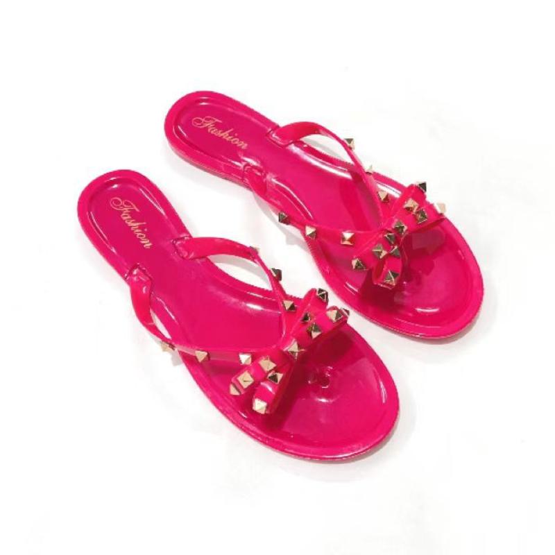 Nieten Fliege Flip-Flops Nieten Jelly Zehensandalen mit Schleife Sommer Schleife Flache Strand Regenstiefel