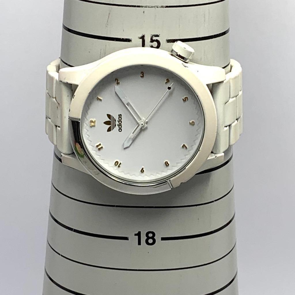Used 127 [Battery replaced and cleaned] Working item NIXON men's watch Nixon adidas white rotating bezel screw pack quartz