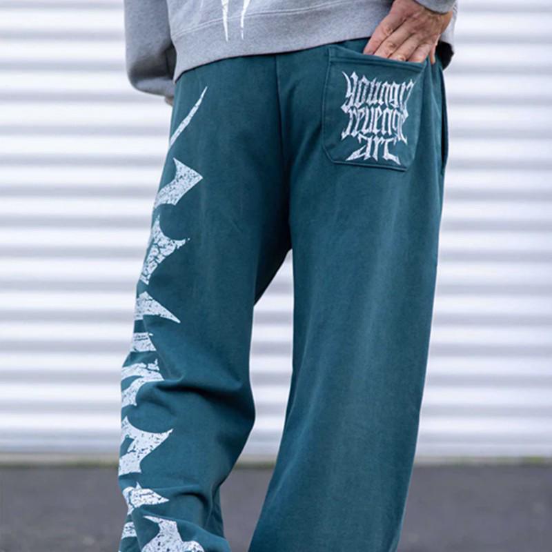 Pánské tepláky se širokými nohavicemi a velkým potiskem - Ležérní módní joggery