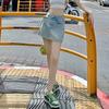Youthful and Slimming Light Blue Shorts High-waisted False Two-piece Design Sense Skirt Pants Straps Irregular Ms. Summer Fashion Denim Short Skirt