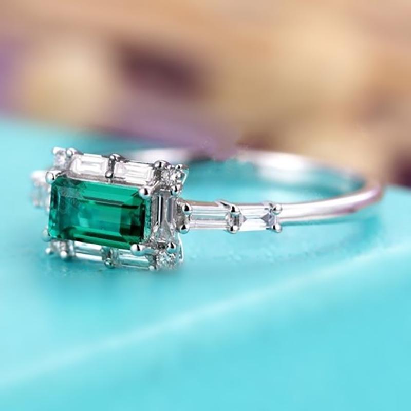 

Европейское и американское модное серебряное женское повседневное кольцо-аксессуар с инкрустацией зеленым цирконом