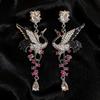 Silver Needle Rhinestone Crane Drop Earrings: High-End Creative European Luxury Ear Jewelry.
