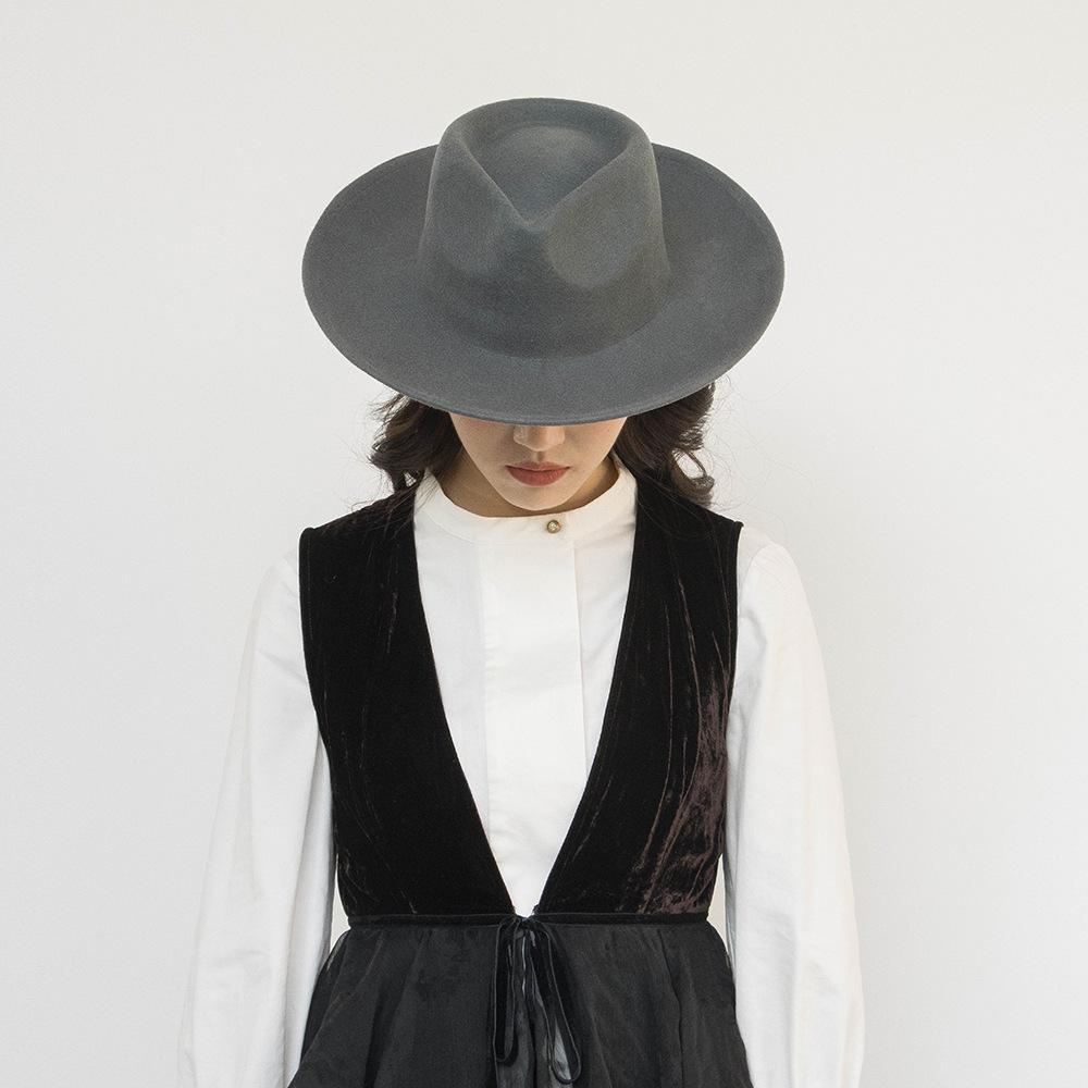 Europe, America autumn and winter new fashion simple wool felt wide brim jazz hat women's casual concave thermal top hat tide