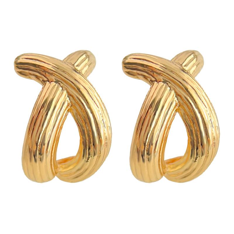 Fashion texture sense European and American style cross earrings design sense personality versatile curved fishtail high sense earrings