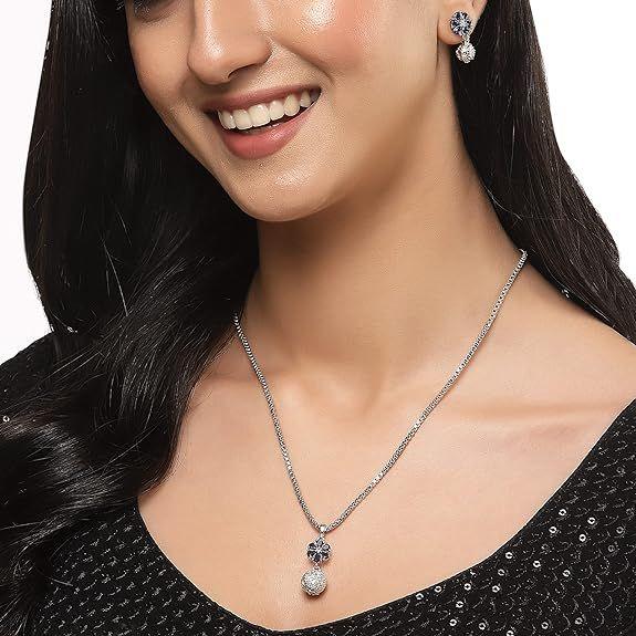 Rhodium-Plated Silver Toned Green Cubic Zirconia Studded Floral Shaped Cute Pendant with Earrings Jewellery Set for Girls and Women (Green)