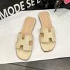 Spot~ Summer lazy H cool slippers fashionable versatile beach flat bottom one-word ins tide white slippers women wear