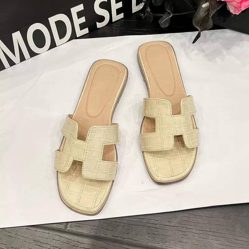Spot~ Summer lazy H cool slippers fashionable versatile beach flat bottom one-word ins tide white slippers women wear
