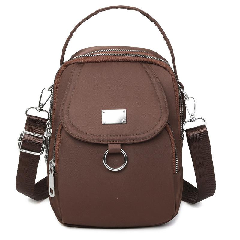 Bolso bandolera ligero de nailon para mujer: minibolso informal con múltiples compartimentos con cremallera y correa de hombro extraíble. Disponible en una docena de colores.