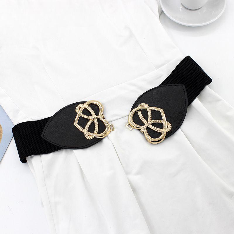 Trendy Womens Black Stretch Waist Belt Offering A Slender Look With Versatile Wear Options