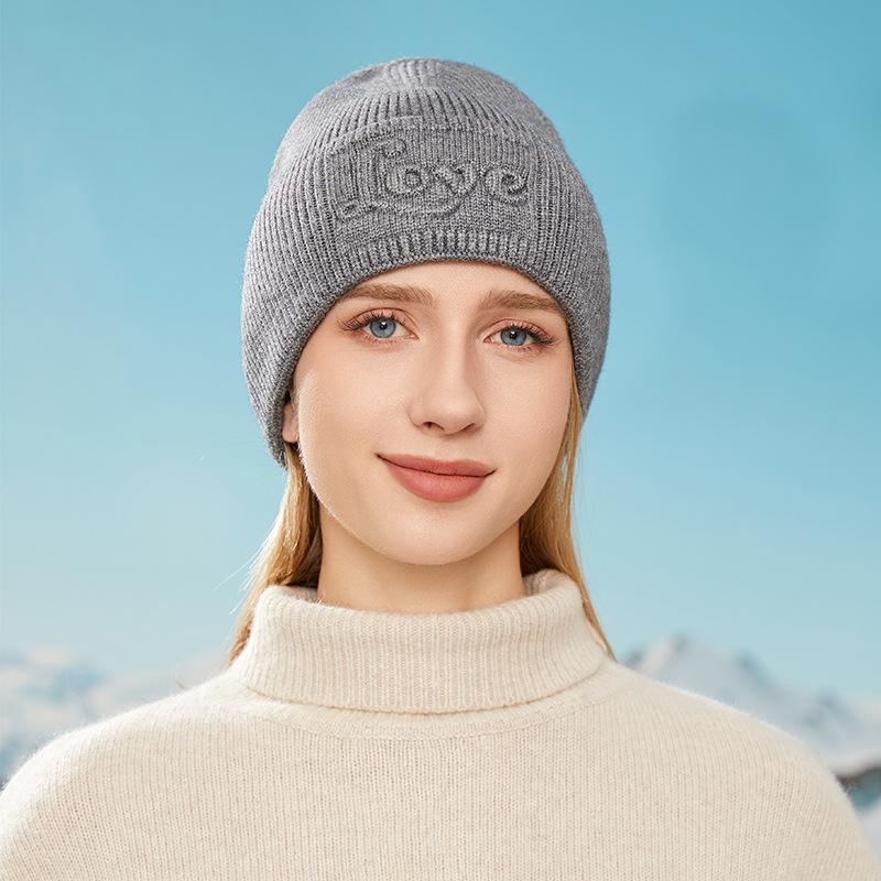 Autumn and winter new thickened warm knitted hats men's and women's ear protectors three-dimensional embossed solid color cold hats