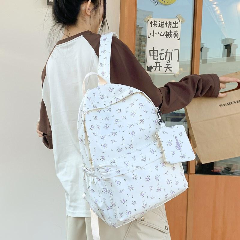 School bag 2025 fresh and cute floral school bag is simple and light for junior high school students, versatile for commuting and large capacity
