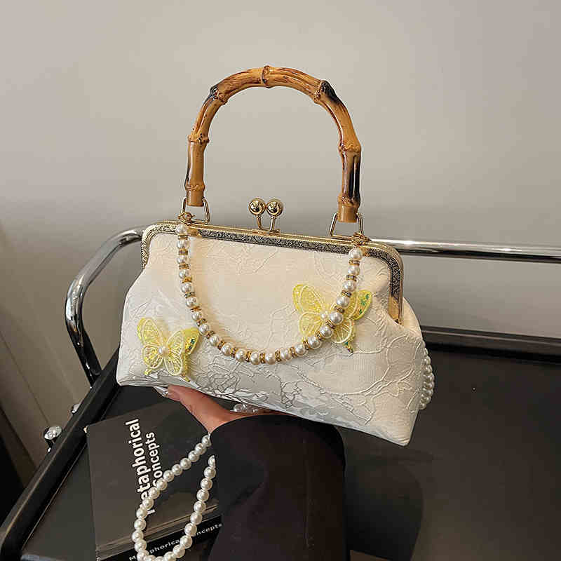 

Fashi 3D Butterfly Embroidered One Shoulder Bag Women Persalized Bamboo Handbag Elegant Pearl Chain Crossbody Bags for Party (20cm<Max Length<30cm) бежевий