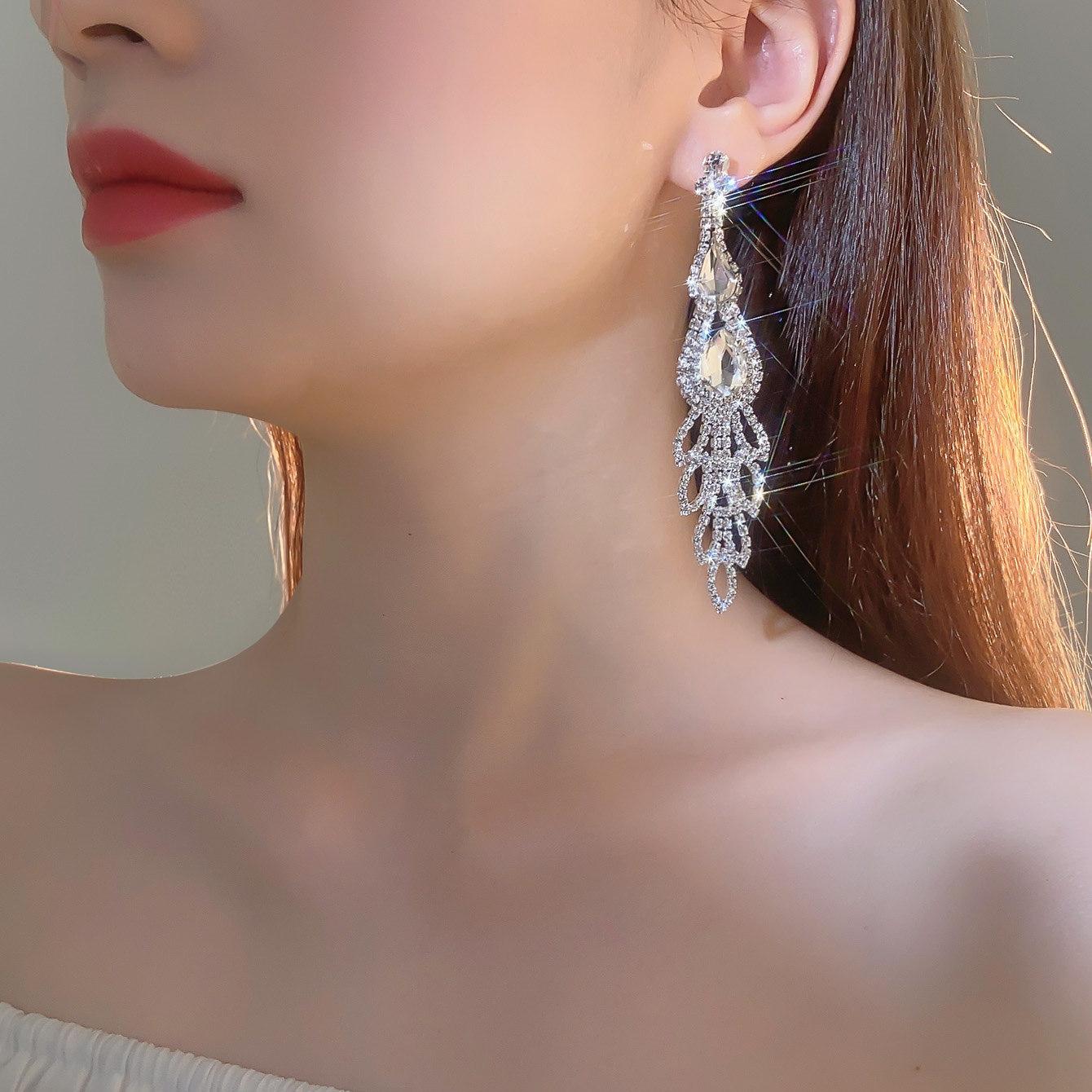 

Европейская и американская мода роскошные блестящие длинные серьги с бриллиантами женские темпераментные серьги-гвоздики с цирконием украшения для ушей