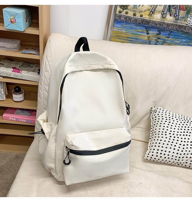 School bag solid color letter fashion backpack Korean version college student lightweight school bag outdoor travel large capacity backpack