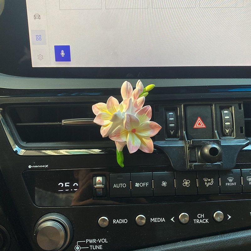 

Freesia Car Air Vent Decoration High-End Aroma Diffuser Stone for Women s Car Air Conditioning Decoration Goddess Flower Gradient Powder