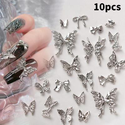 10 piezas/bolsa de abalorios de flores y estrellas con forma de mariposa para uñas, aleación de plata, perlas, accesorios de joyería para uñas