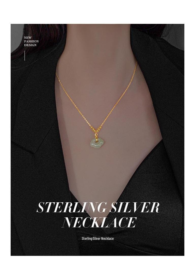 925 Silver Peace Lock Necklace with Hetian Jade & 14K Gold Clavicle Chain, Featuring a Retro Ruyi Longevity Lock Pendant for Women.
