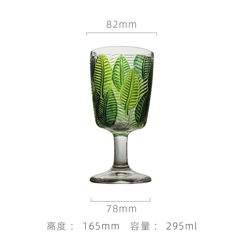 Medieval glass goblet with leaf pattern embossed goblet