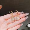 New lucky bag opal earrings design sense personalized money bag earrings light luxury versatile niche unique ear buckle