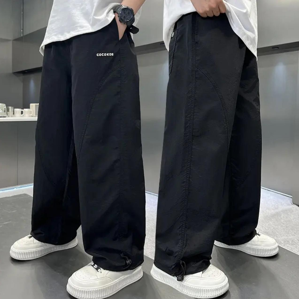 

Весенне-осенние спортивные штаны для мальчиков 2025 новый стиль, осенние повседневные брюки для подростков, детские осенние прямые брюки, брюки для мальчиков 120 чёрный