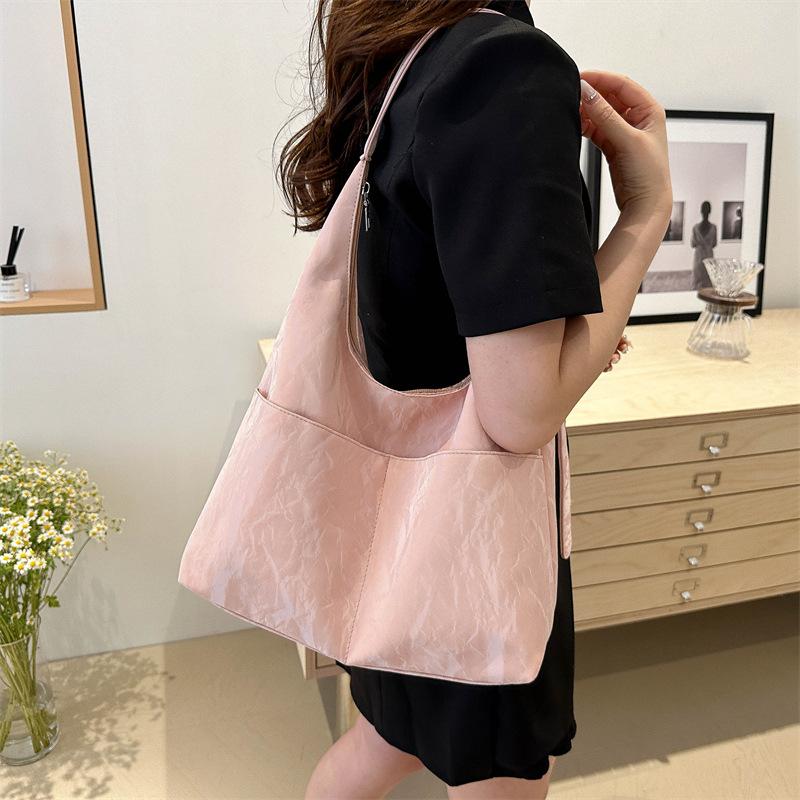 Taschen für Damen Tragetaschen Große Kapazität Frühling und Sommer Umhängetasche Neue Schultertasche Modische Klasse Pendeltasche