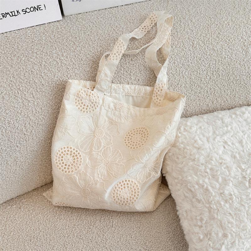 

Literary and artistic hollow embroidery shoulder bag Large capacity canvas vest bag Gentle temperament women s tote bag