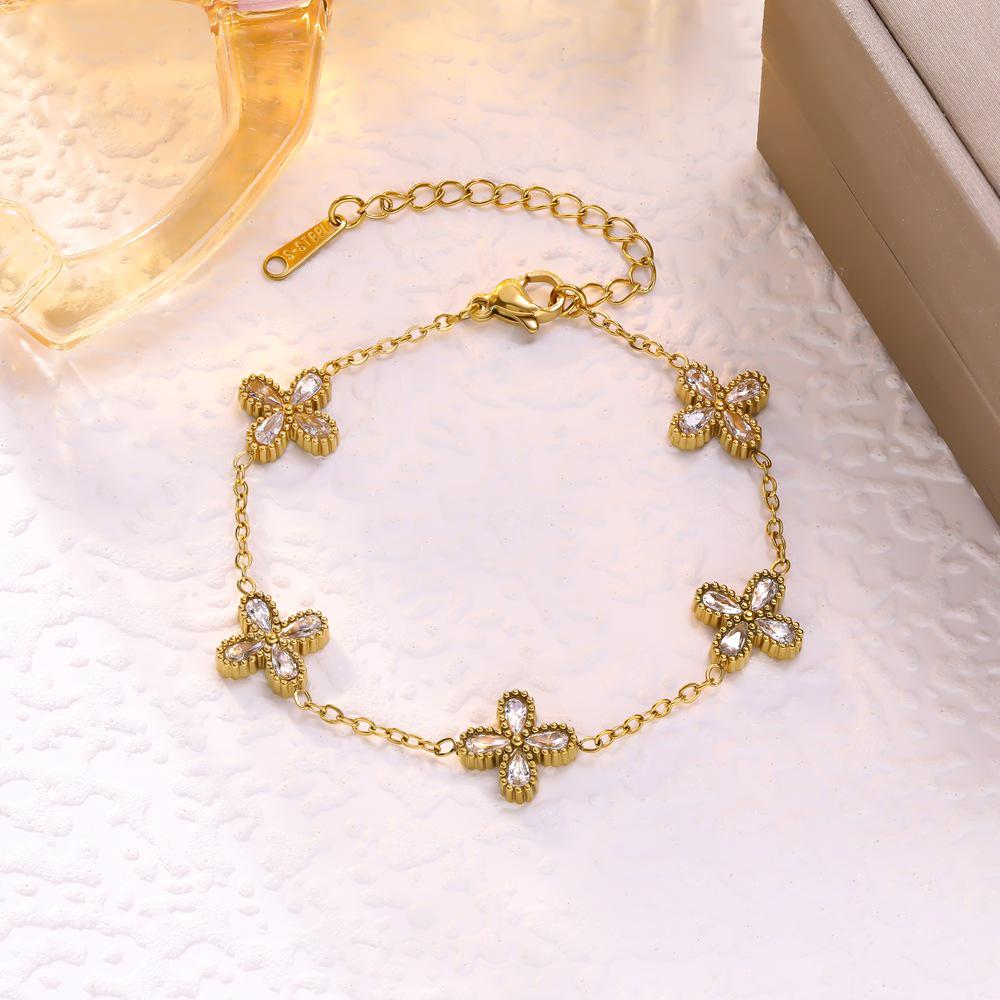 Trendy High-End Zircon Titanium Four-Leaf Clover Jewelry Set: Necklace, Bracelet, Earrings for Women