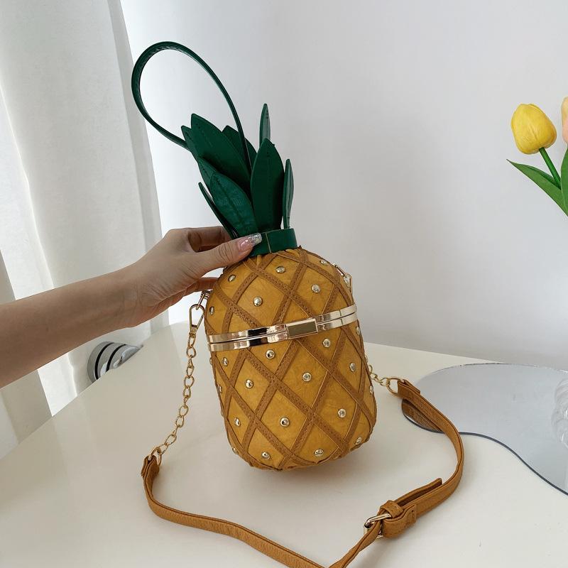 

Personalized pineapple modeling bag 2025 small fresh literary girl ins shoulder crossbody rivet chain cylinder bag зелений