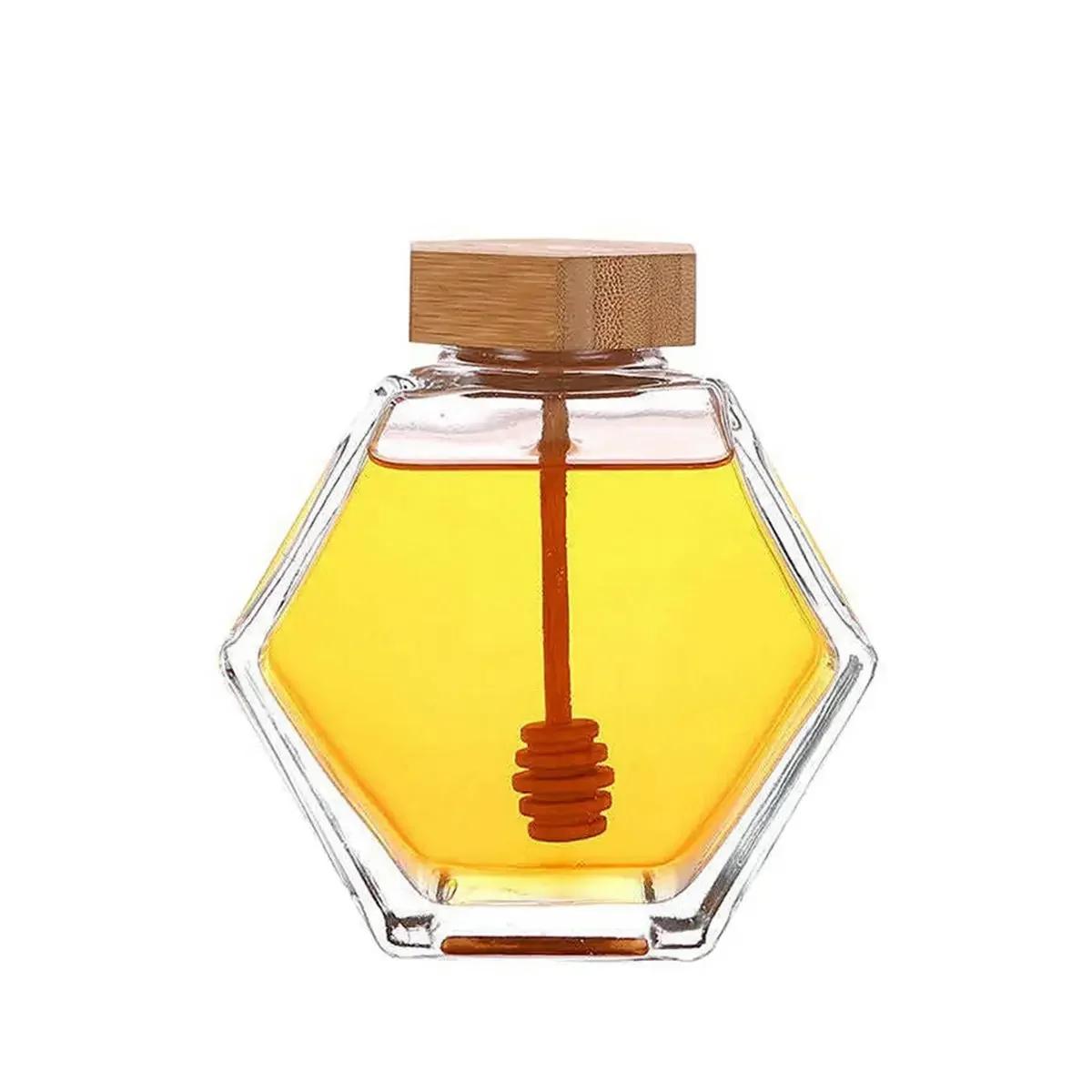 

Hexagonal Glass Honey Bottle with Wooden Stirring Rod Packaging Bottle Small Honey Bottle Container Honey Jar container