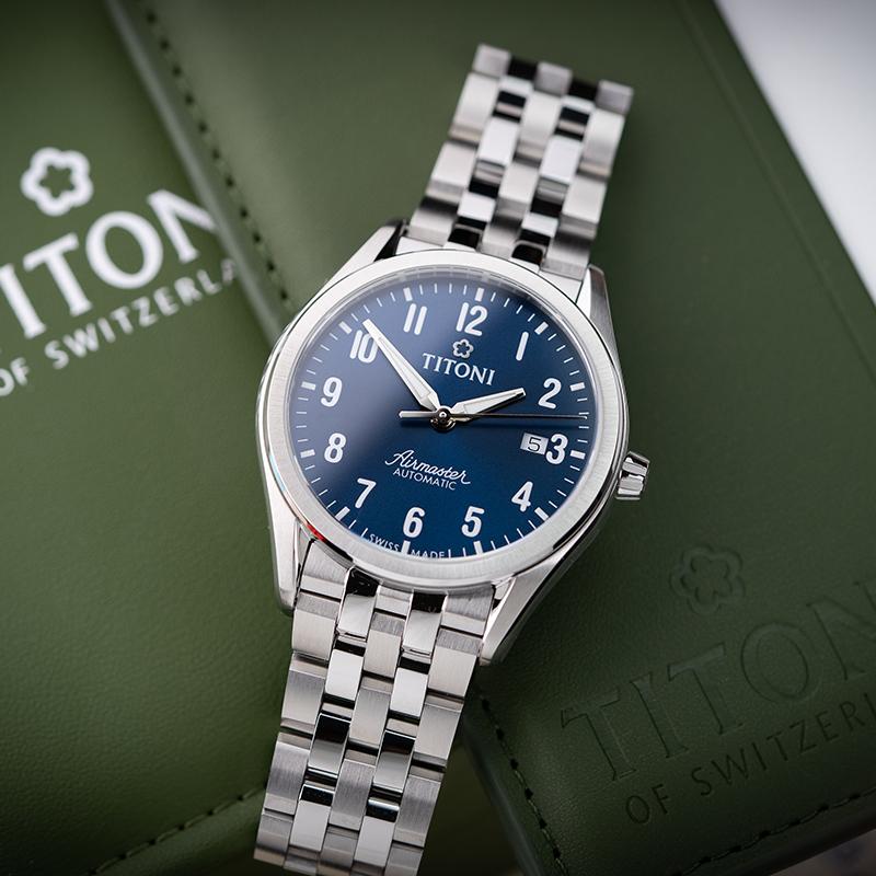 TITONI Plum Blossom Airmaster Series Automatic Mechanical Movement Fashionable Casual Blue Dial Stainless Steel Case Stainless Steel Strap 83906 S-701