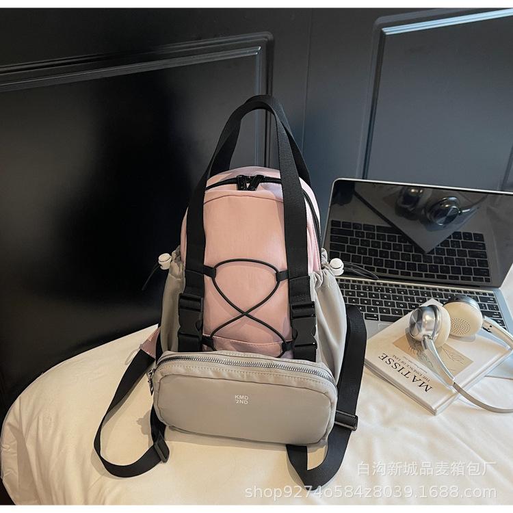 

Korean niche student schoolbag women s 2025 new trendy spring fashion backpack student travel canvas bag backpack рожевий