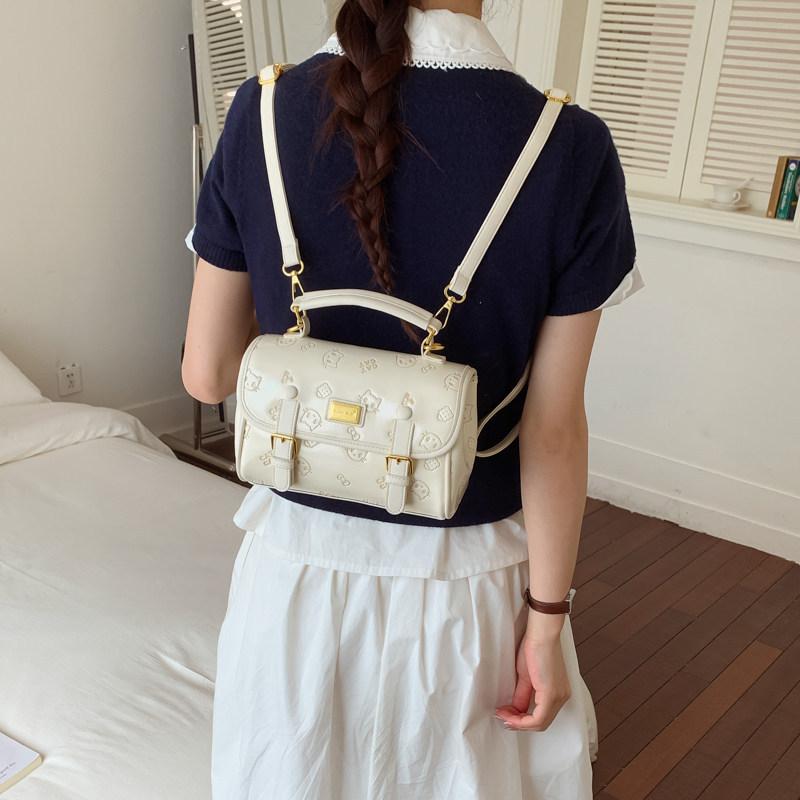 Schoolbag Korean Girl Style Cartoon Printed Backpack Women's 1011 New Fashion Exquisite Niche Versatile Commuter Messenger Bag