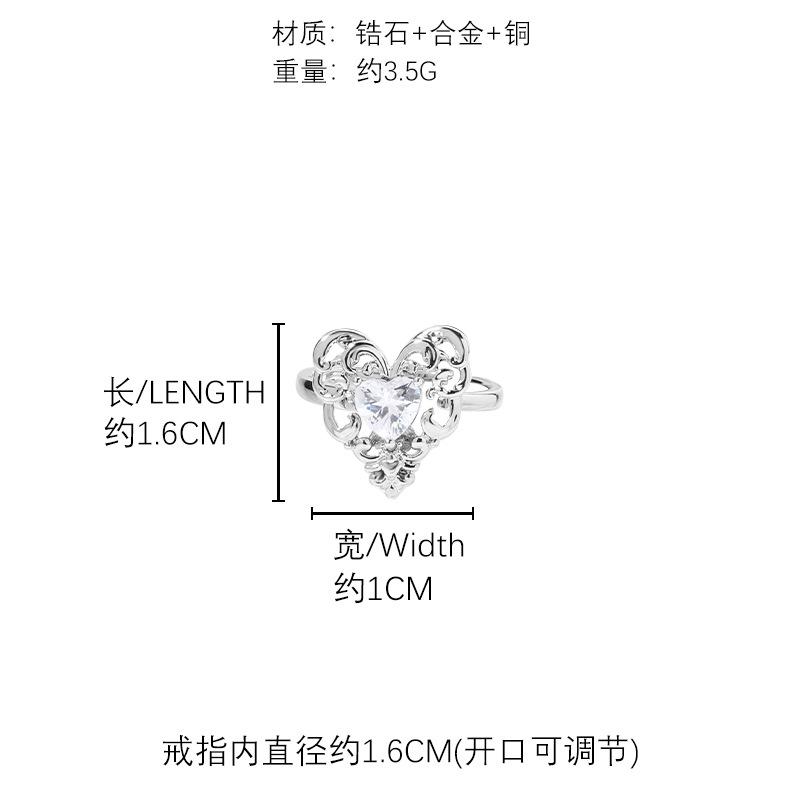 Cold sense hollow love 925 earrings silver needle high sense inlaid zircon stud earrings wind temperament earrings