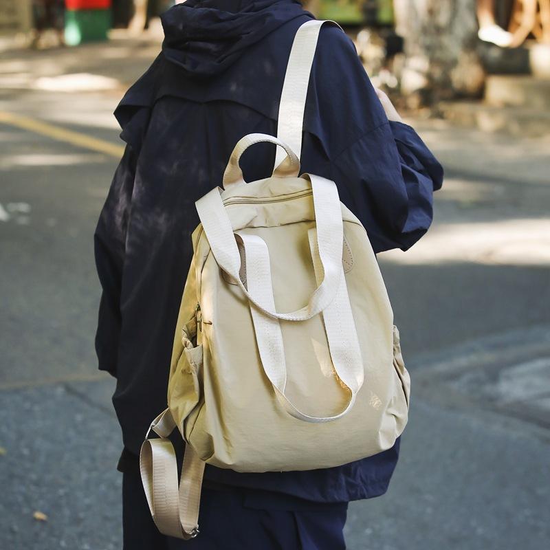 Schoolbag Korean version portable backpack female versatile leisure student make-up bag niche design shoulder bag lazy wind handbag