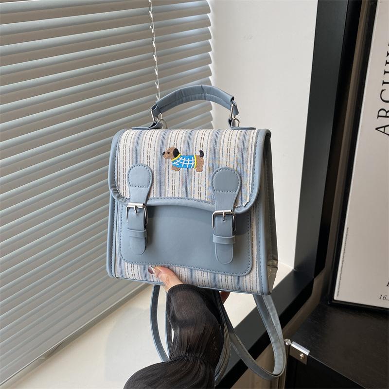 

Autumn and winter niche plaid female college student backpack 2025 new popular travel messenger bag versatile small backpack синій