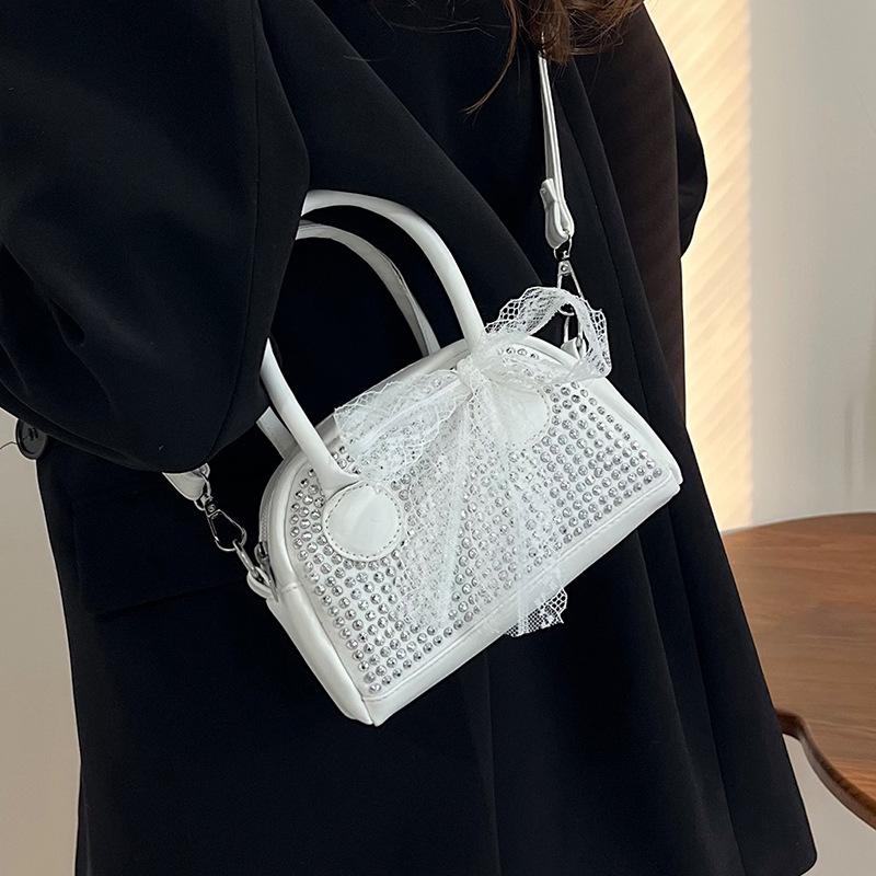 

Маленькая квадратная сумка с инкрустированной бриллиантами текстурой для женщин, новая корейская модная и простая сумка через плечо, блестящая ручная квадратная сумка