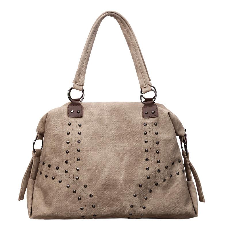 The Large-capacity Rivet Commuter Tote Bag Is A Popular, Casual and Versatile Single-shoulder Underarm Women's Bag