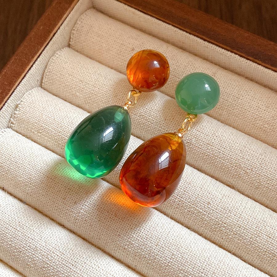 

Silver needle resin asymmetric water drop earrings new retro versatile stud earrings light luxury high-end earrings
