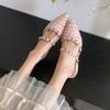 Fashion Rivet Wrapped Head Semi-drag Women Wear New Pointed Toe Shallow Mouth Slip-on Low-heeled Shoes in Summer