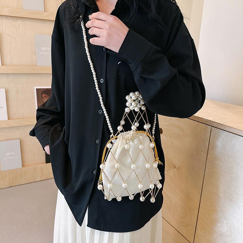 Personalized pearl handmade hollow bag, fishing net women's portable bucket bag, temperament versatile single shoulder messenger bag