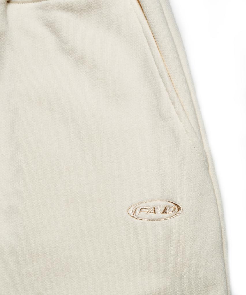 Epeueidi Two-Way Sweatpants (Ivory)