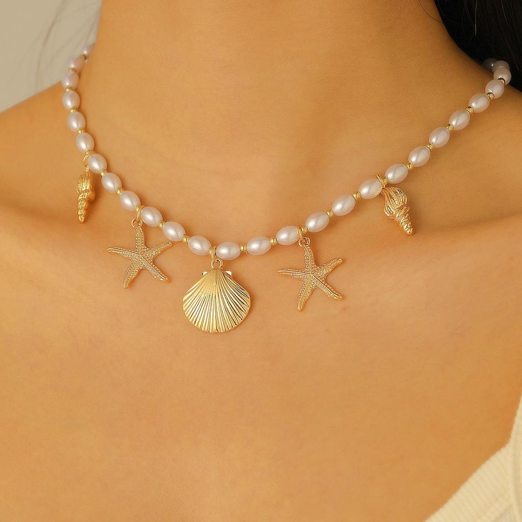 Set Collana e Bracciale Estivo Bohemien con Stella Marina, Conchiglia e Perle