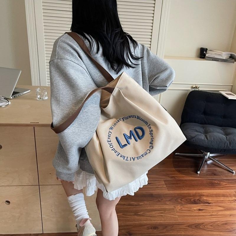 Single shoulder women's new tote bag, student make-up bag, portable go out and light go to work, single shoulder commuter bag